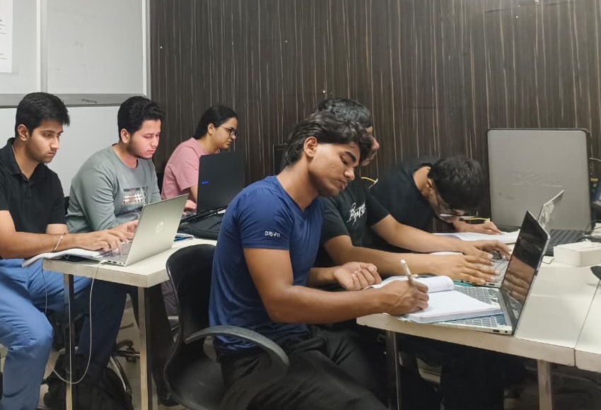 A small batch working in the Simply2Cloud lab in Rohini